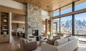 Luxury home renovation in Utah featuring open great room with custom millwork and mountain views